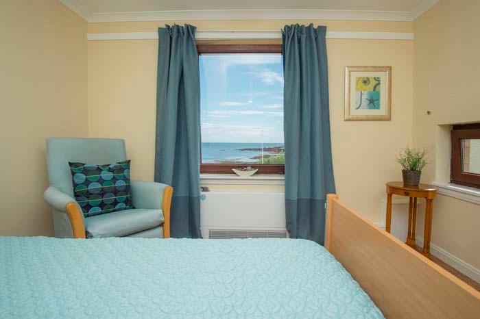Bedroom with a sea view