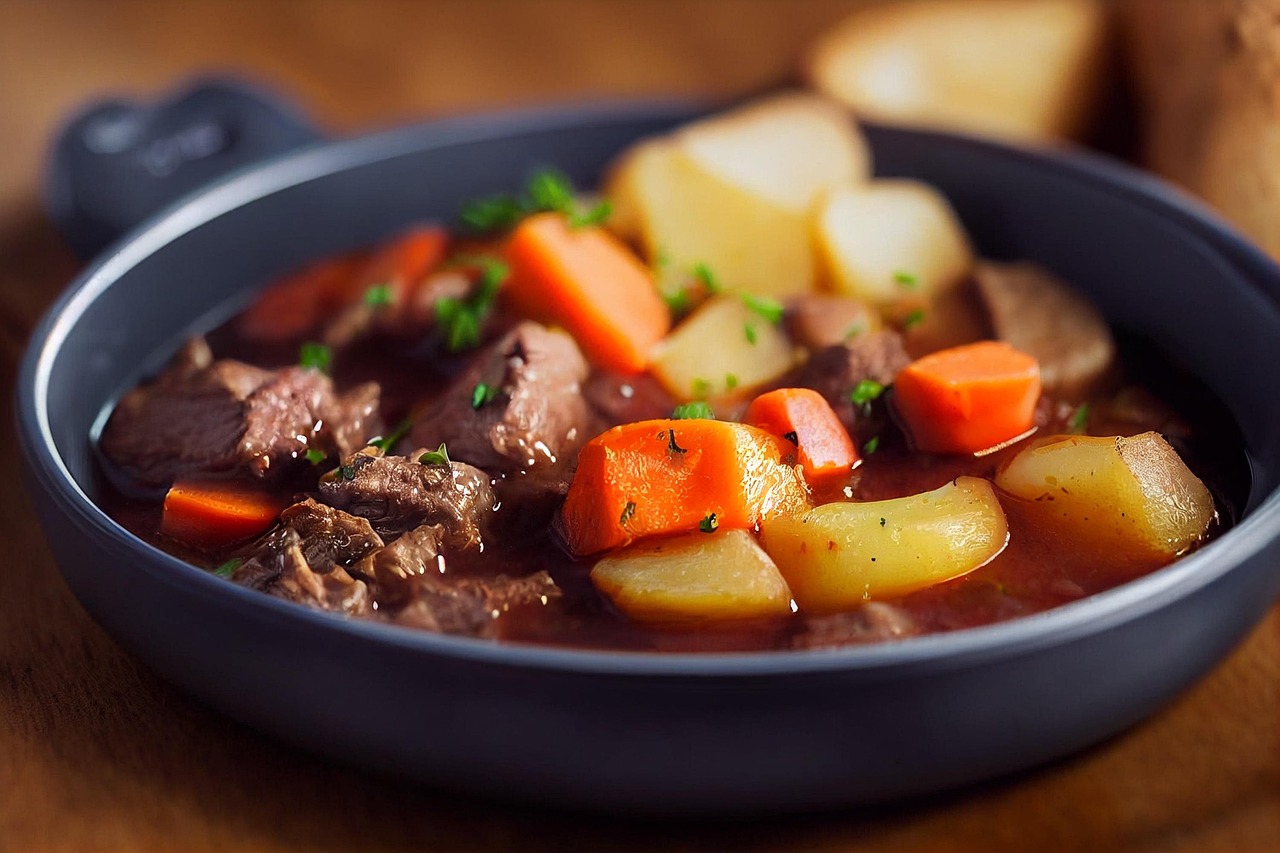 stew in a dark blue bowl