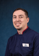 man in clinical lead uniform in a care home