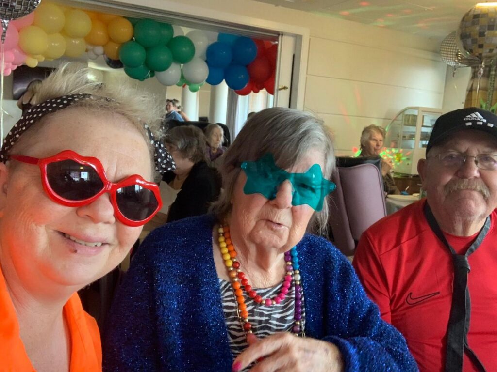 residents and staff celebrating care home milestone