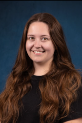 activities coordinator with long brown hair