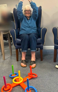 resident playing ring toss