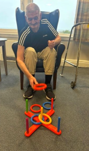resident playing ring toss